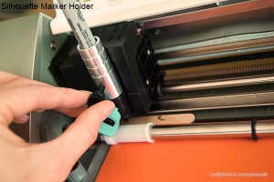 Silhouette pen holder