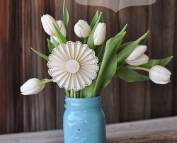 Beautify a bouquet with a DIY paper medallion.