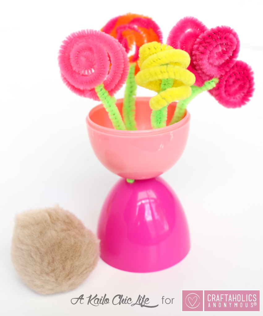 Kid Friendly Spring Flower Vase craft using plastic Easter eggs and pipe cleaners