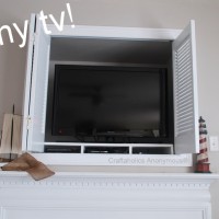 So….what is exactly is behind the White Shutters on my Mantel?