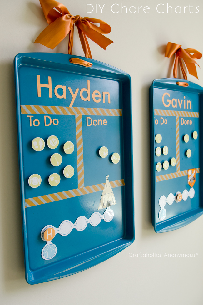 Cookie sheets turned into chore charts. Brilliant! Cheap + they're magnetic. 