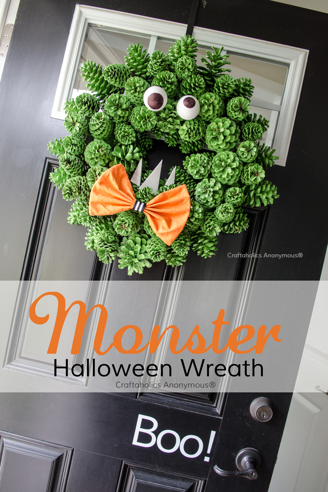 Love this Halloween Monster Wreath made with pinecones. The texture is perfect!