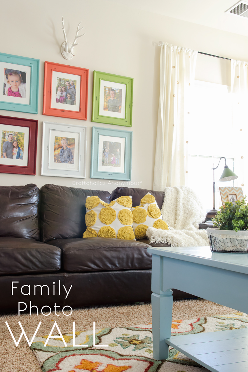 Family Photo Wall || love the colorful picture frames!
