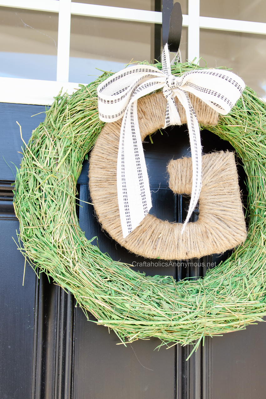 Monogram spring wreath || Love the twine letter and grass wreath form!