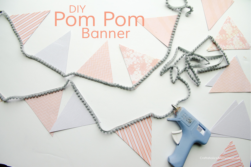 DIY Pom Pom Banner :: use pom pom trim or ric rac for super cute and easy paper pennant banners with personality!