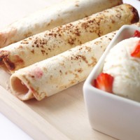 An easy summertime dessert! Strawberry and Nutella Cheesecake Flautas