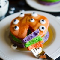 Halloween Pancakes in purple, green and orange colors. Perfect for Trick-or-treat night!