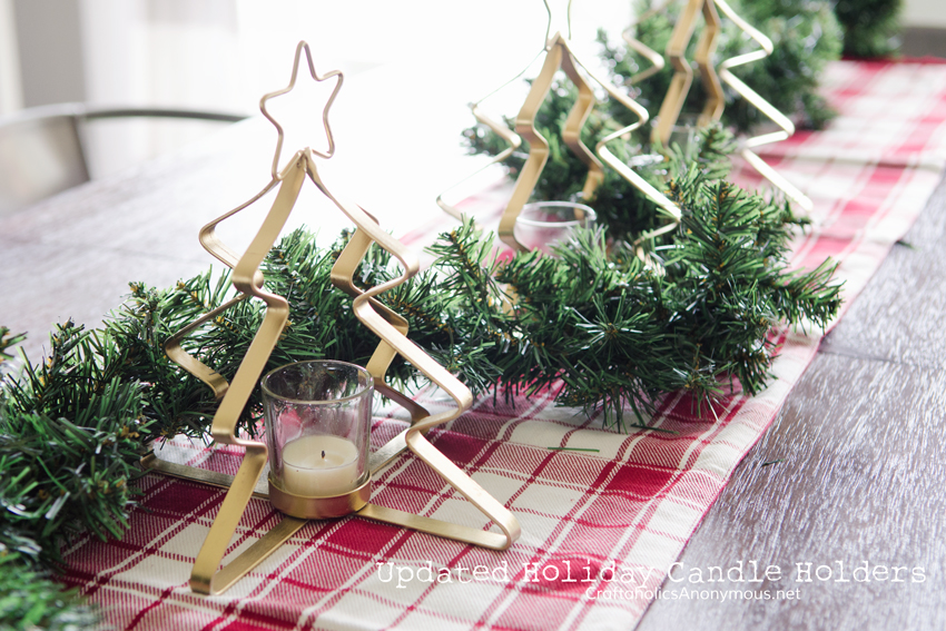 Update silver holiday candle holders with a coat of metallic gold spray paint