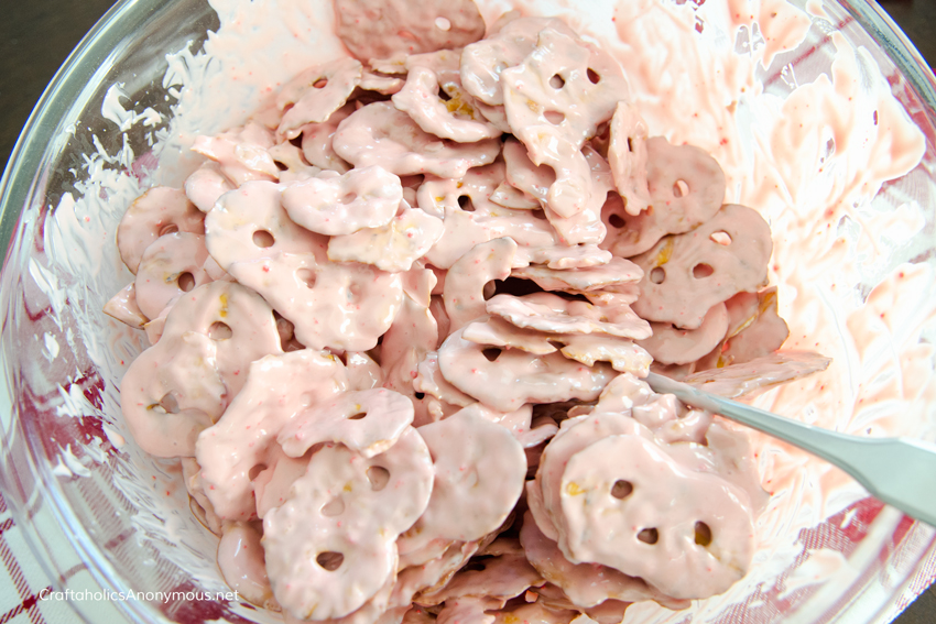 Pretzels covered in Peppermint Candy Coating. Amazing and easy recipe! only 4 ingredients.