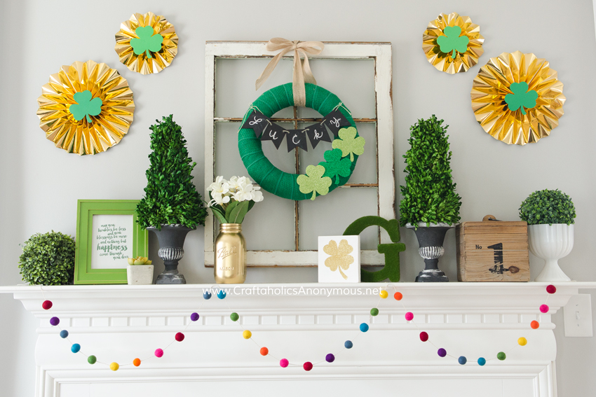 St. Patrick's Day Mantle scape. That rainbow felt ball garland is to die for!