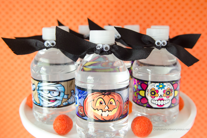 Simple ribbon bats on for Halloween Water bottles. Great for parties or trick-or-treating!