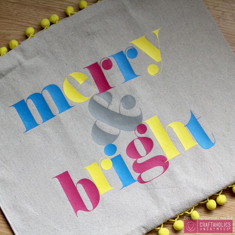 merry and bright pom pom pillow
